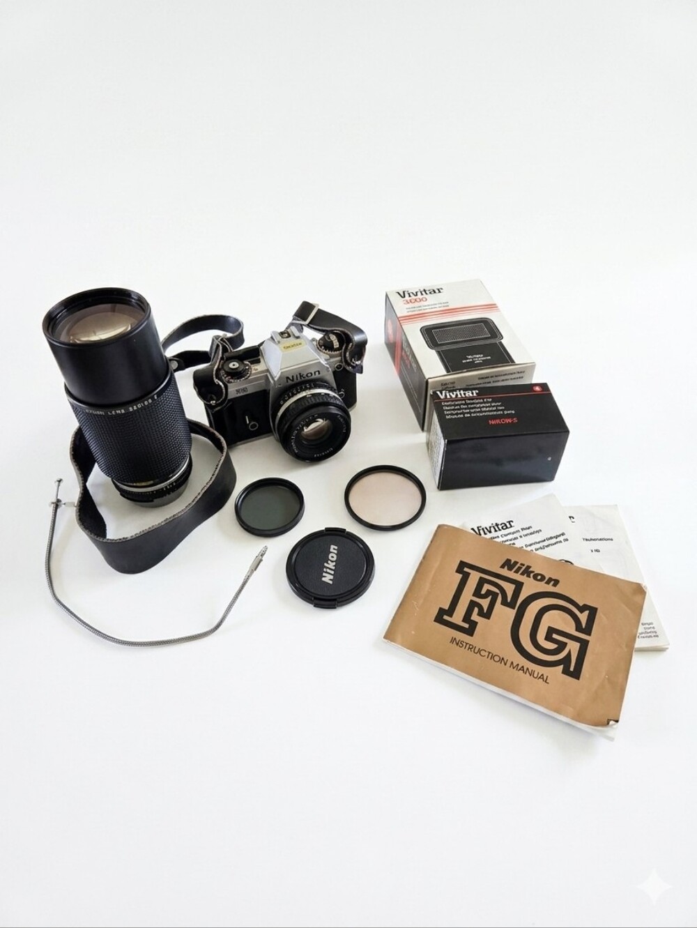 Nikon FG 35mm Film Camera Kit - 50mm f/1.8 & 70-210mm Lenses